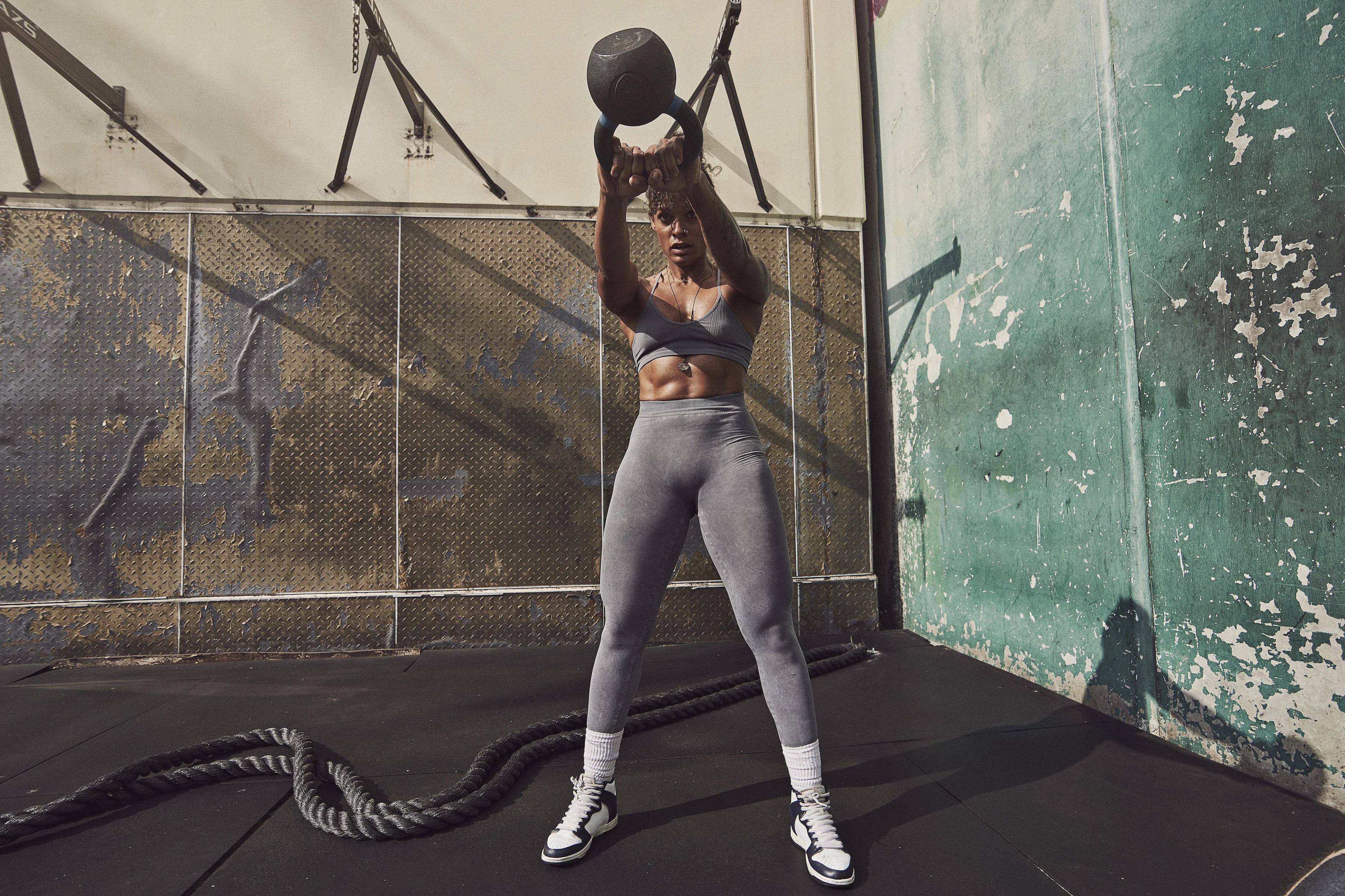 Athlete mid stride on textured flooring